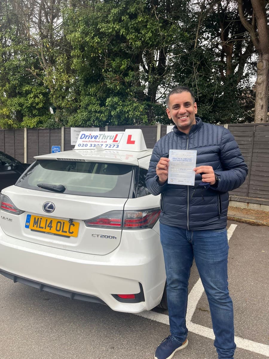 Smiling student passed driving test East London