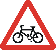 UK cycle route warning sign showing bicycle in red triangle